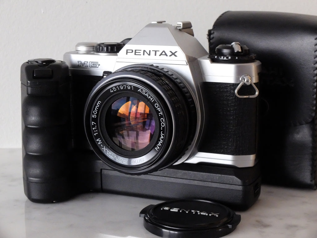 Pentax MG & SMC 50mm f/1.7 w/ Flash, Winder, Cap & New Seals