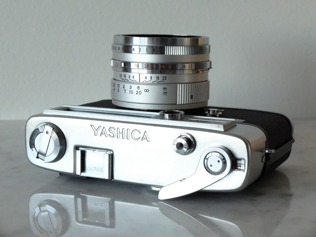 Yashica Lynx 5000E & 4.5cm f1.8 w/ Case, Cap & New Seals