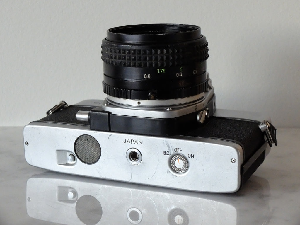 Minolta SRT102 & Rokkor-X 50mm f1.7 w/ Filter & New Light Seals